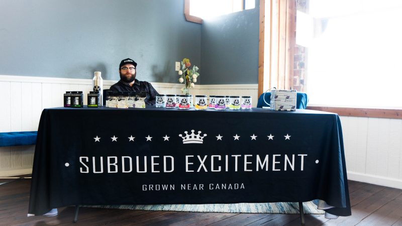 Subdued Excitement Vault Cannabis Vendor Day Table in Silvana, Washington.