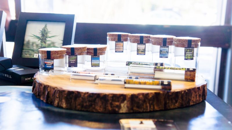 Burnwell Co flower and pre-roll selection example at the Vault Cannabis Vendor Day in Spokane, Washington. Strains include Hindu Sour, Candy Jack, Peaches & Cream, Animal Crackers, Blue Lights, and Grand Hindu.